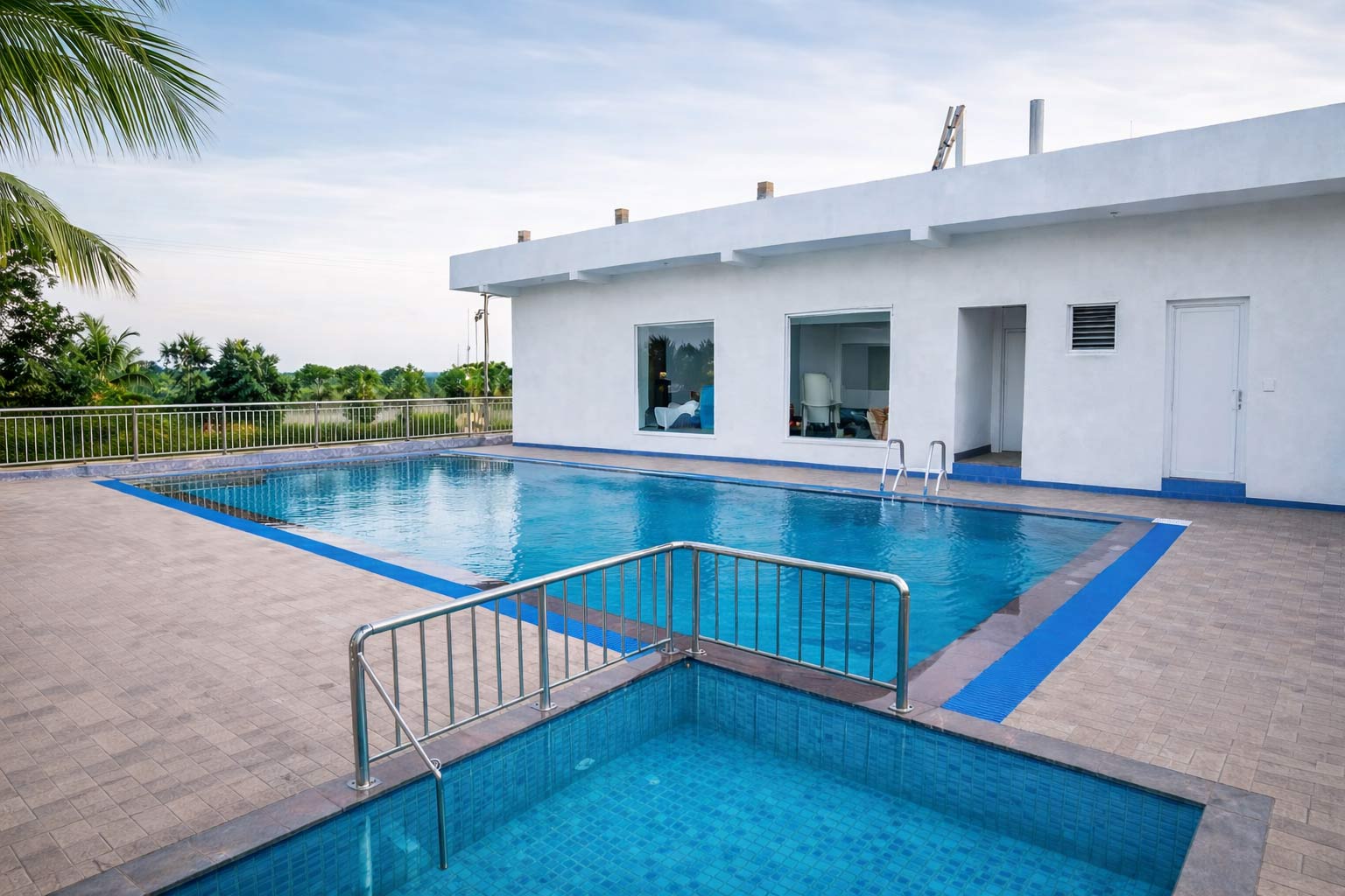 Swimming pool at Thai Beach Resort Tiruchendur