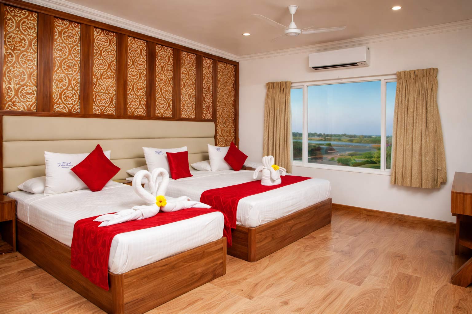  Room at Thai Beach Resort Tiruchendur with twin beds and scenic view