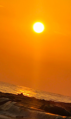 Bright sunrise view over the sea at beach resort