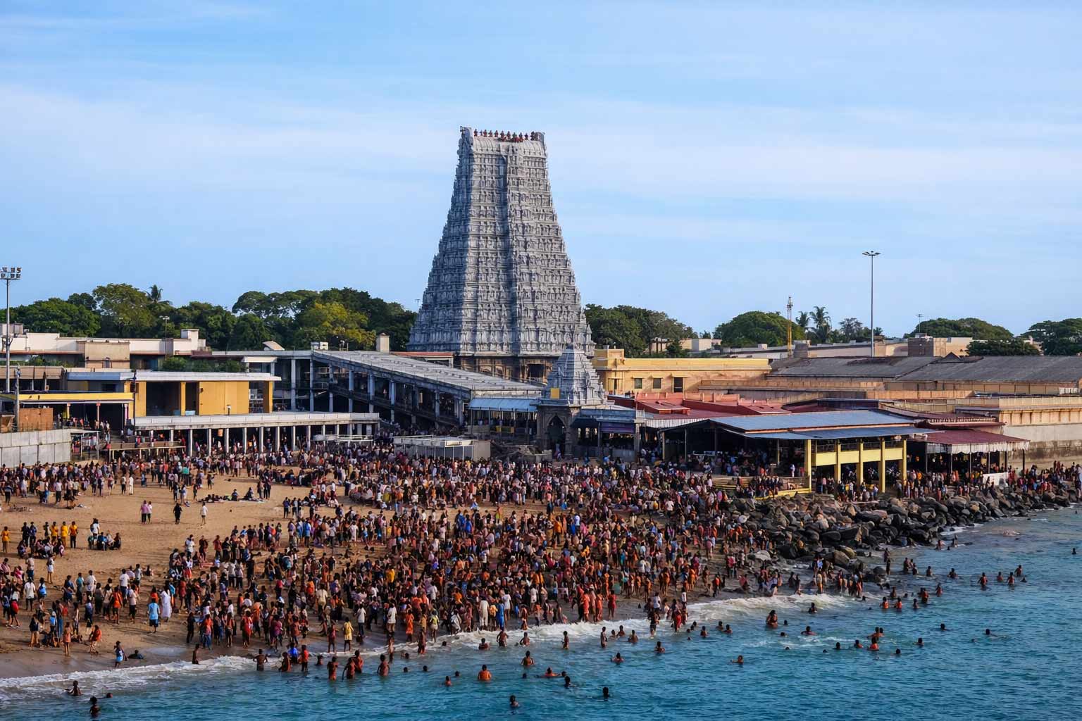 Tiruchendur Murugan Temple tower gopuram with devotees