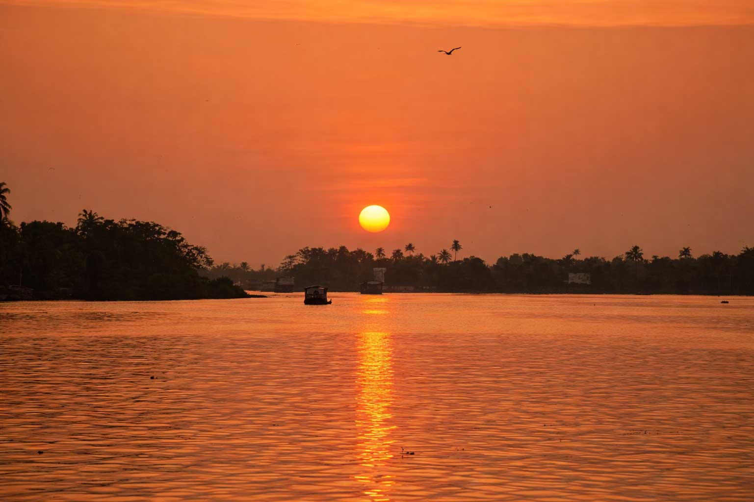 Orange sunset reflection in Punnakayal Backwaters Tiruchendur