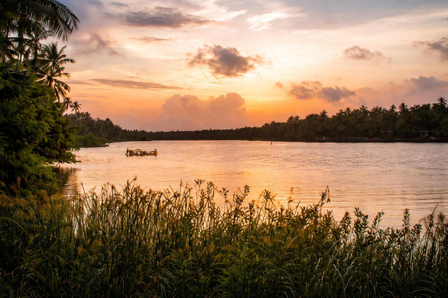 Wide landscape view of backwaters in Tiruchendur