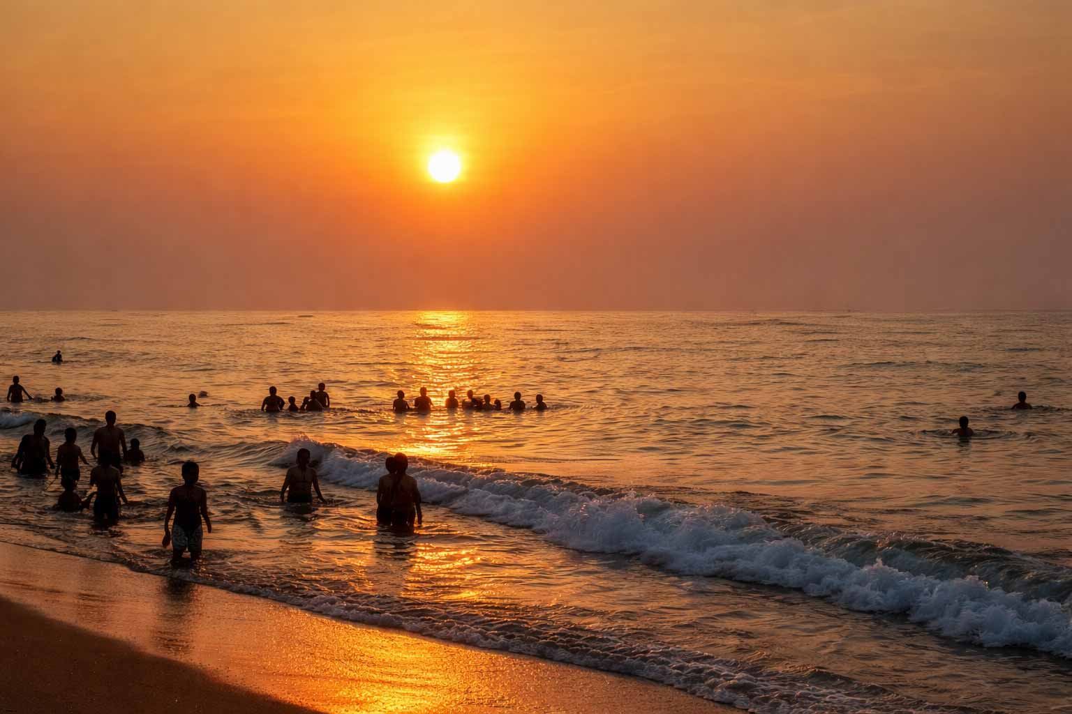 Sunset at Tiruchendur beach with golden reflection on water