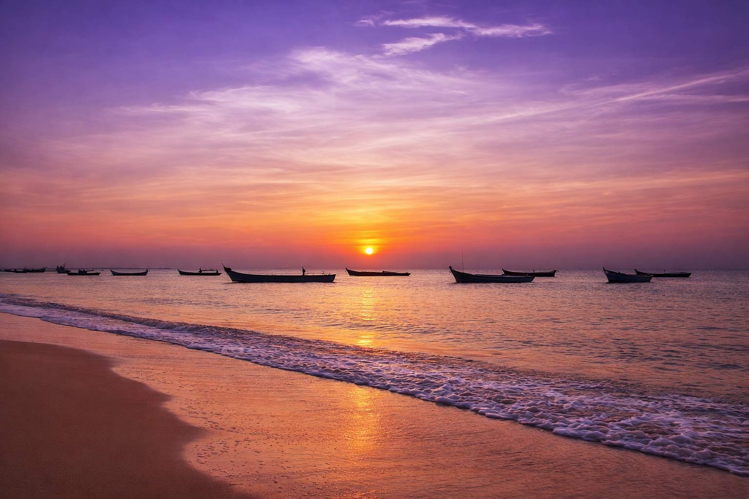 Evening view of Tiruchendur beach with colorful sky and sea